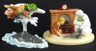 Two large Coalport Snowman characters, Walking in the Air and By The Fireside snowman figures, boxed.