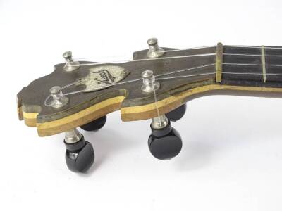 A Keech Banjolele banjo, numbered 219720/24, with ebonised finger board inlaid with mother of pearl, the main body bearing facsimile signature and veneered in maple, in a fitted case. - 4