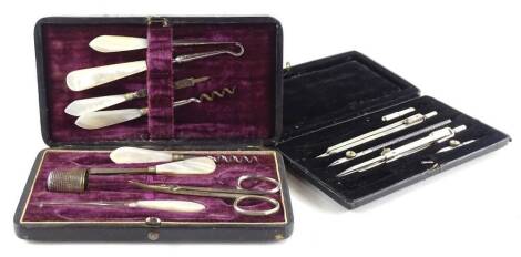 A mother of pearl and plated metal ladies neccessaire, in a fitted case and a set of drawing instruments. (2)