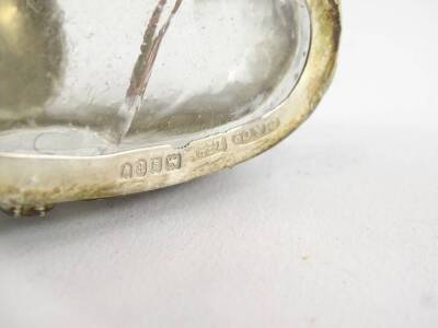 A set of three silver and cut glass heart shaped salts, with associated spoons, the salts hallmarked London 1902. (AF) - 2