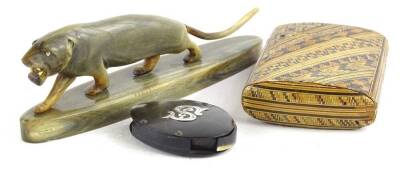 A 19thC horn magnifying glass, with white metal mount initialled S, a straw work cigar box and cover and a horn carving of a tiger.