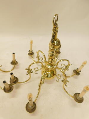 A near pair of Continental six branch chandeliers, each decorated with a Prussian type eagle, scrolls etc., 70cm W. - 2