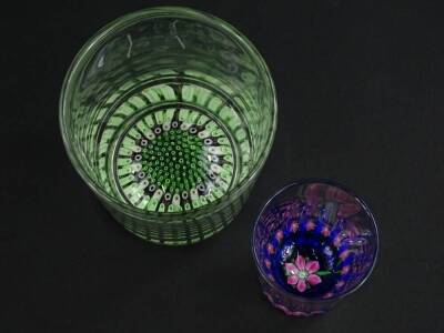 A Whitefriars tumbler, with mainly green millefiori decoration to the base, and a small Whitefriars shot type glass with pink flower to the base. - 2