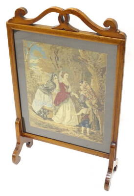 A rare Victorian Crossley embroidered firescreen banner, the panel decorated with a lady with attendants, a child and a dog, in various colours, the screen with a mahogany frame, on shaped end supports, label for Crossley's patent Mosaic pattern no.98, co