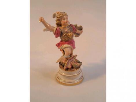 A late 19thc Meissen porcelain figure of a cherubic god