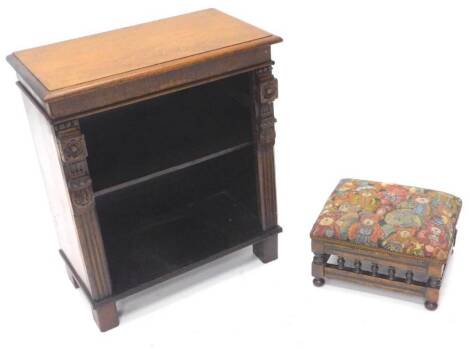 A small Edwardian mahogany side cabinet or bookcase, the rectangular top with a moulded edge above a recess with a shelf, and part reeded pilasters on block feet, 50cm W, and a footstool.