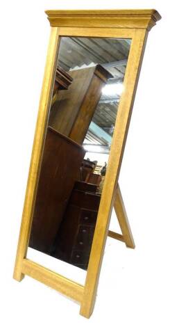 A modern oak dressing mirror, with decorative cross banded border, 151cm H, 59cm W.