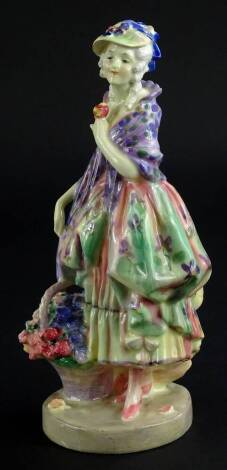 A Royal Doulton porcelain figurine, Phyllis, printed mark in green to underside and hand written names.