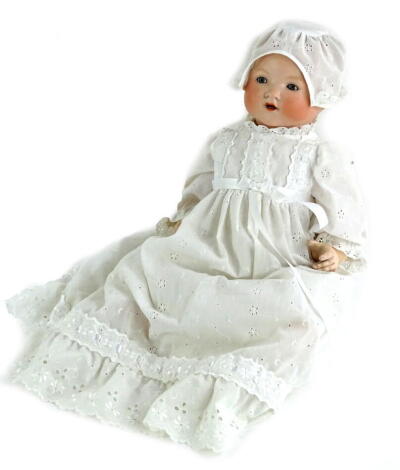 A Armand Marseille bisque headed doll, with sleeping eyes, open mouth, numbered 351/6K, with composition limbs, later dress, 47cm L.