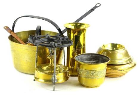 A collection of brass and other metalware, to include a shell case, a paraffin stove etc.