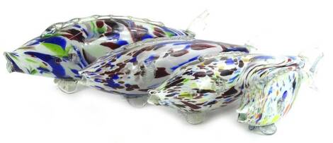 Four Murano style mottled glass fish, the largest 53cm W.