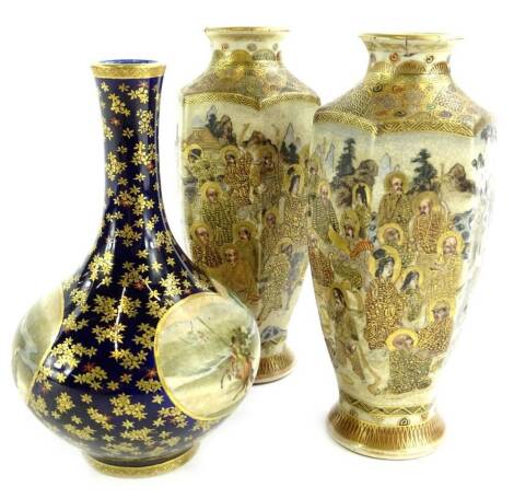 A pair of Japanese Satsuma vases, each decorated with figures in gilt (AF), 25cm H and a Japanese earthenware bottle shaped vase (AF), 15cm H.