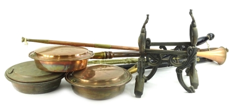 Miscellaneous items of metalware, to include three warming pans with turned wooden handles, a pair of iron and brass fire dogs etc.