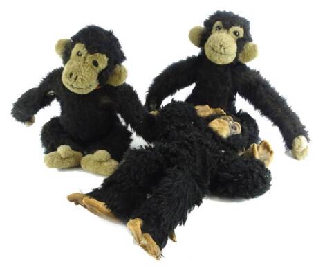 Three early to mid 20thC monkey toys, to include one with rubber hands and feet (AF).