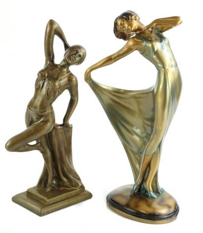 A gilt and painted plaster Art Deco figure of a lady, in flowing dress, on oval base, 41cm H and an Art Deco bronze plaster figure of a dancing lady (2).