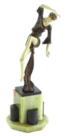 A cold painted metal Art Deco style figure, of a dancing lady, with composite limbs, on an onyx base (AF), 43cm H.