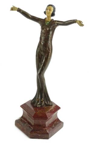 A cold painted bronze figure of a lady, with composite head, hands, on a rouge marble base, 36cm H.