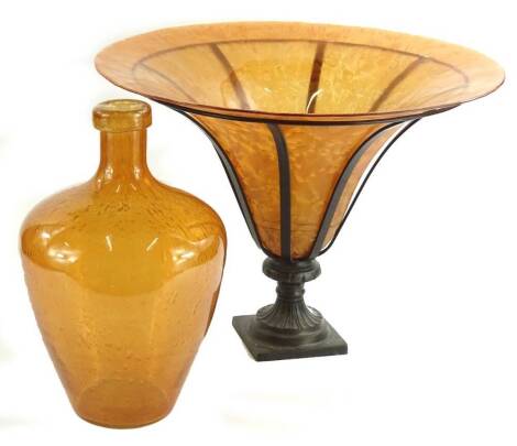 A modern glass centrepiece, the amber tinted bowl decorated to simulate butterfly wings, 49cm dia. and an amber tinted glass vase, 35cm H.