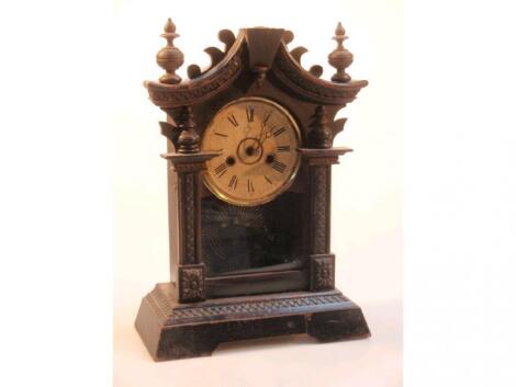 A Junghans ebonised mantel clock