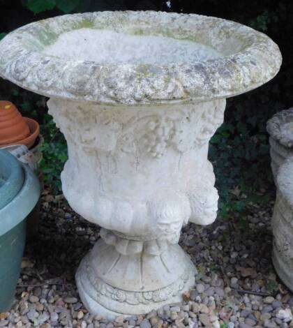 A composite two handled campana garden urn, with gadrooned border and tapering base, 61cm H.