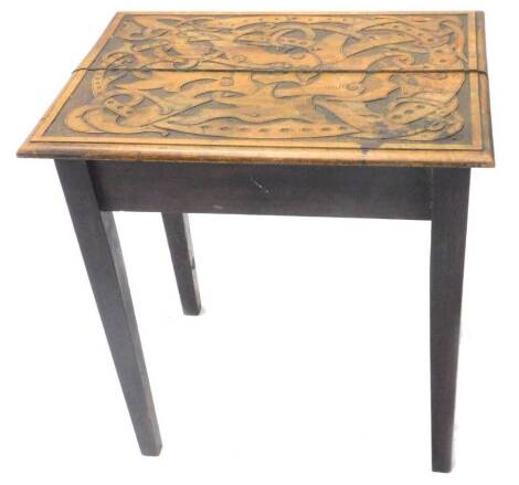 A late 19th/early 20thC mahogany and pine occasional table, the rectangular top with a Celtic design, 63cm W.