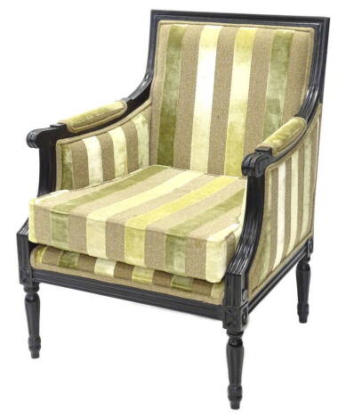 A Continental ebonised armchair, upholstered in striped fabric, on turned and fluted legs. Provenance: The property of Joan Stephenson, Kirkwood, North Church Walk, Newark, Nottinghamshire. The upholstery in this lot does not comply with the 1988 (Fire & 