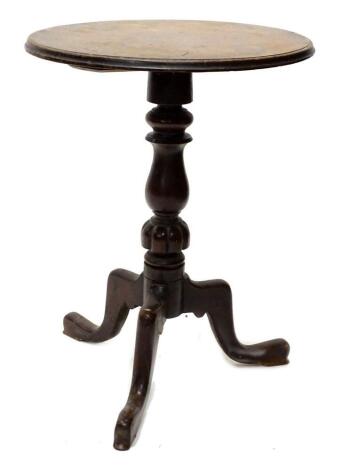 A Victorian walnut occasional table, the circular top on a turned column and tripod base, 50cm dia.