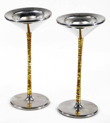 Stuart Devlin for Viners. Two beakers, 12cm H, orb flower holder, dish and two candlesticks, each in parcel gilt, marked beneath. (a quantity) - 4