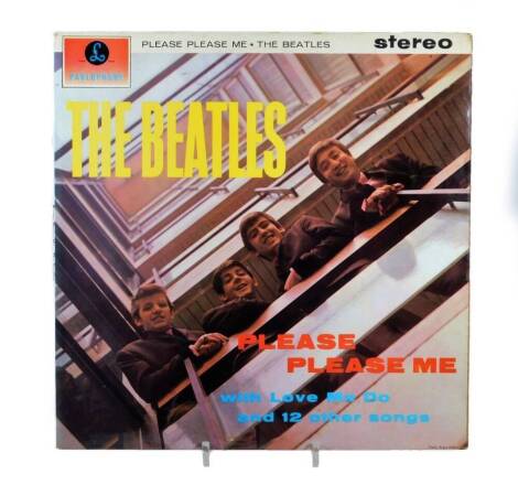 The Beatles record Please Please Me, 33 1/3 Parlophone stereo first pressing, with Dick James credits, gold on black ground, YEX 94/1 and YEX 95/1, in slip wrapper and outer sleeve.