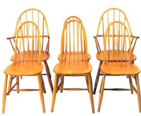 A set of six (4+2) 1950s Windsor type chairs, each with hoop backs, stick splats and turned legs joined by H stretchers, some stamped F, each carver, 100cm H. (6)