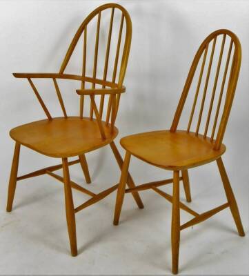 A set of six (4+2) 1950s Windsor type chairs, each with hoop backs, stick splats and turned legs joined by H stretchers, some stamped F, each carver, 100cm H. (6) - 2