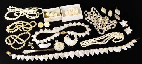 A quantity of mother of pearl and bone jewellery, to include mother of pearl necklaces, brooches, mother of pearl topped silver plated tweezers, a bone screw on earring, a necklace, various other mother of pearl necklaces and earring sets. (a quantity)