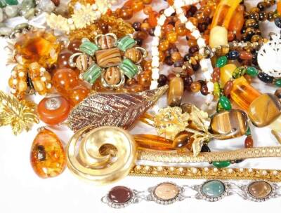 A quantity of costume jewellery, to include beaded necklaces, imitation amber, imitation tiger's eye, drop earrings, cameo style brooch, bangles, earrings, etc. (a quantity) - 5