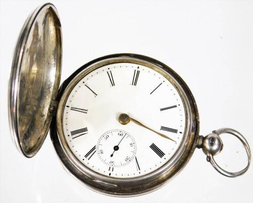 A Victorian silver hunter pocket watch, with engine turned case, plain ring handle, 4cm Dia. Roman numeric dial with subsidiary Arabic secondhand and a keywind movement, the case, London 1848, 11cm H.