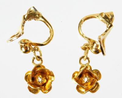 A pair of gold plated rose drop earrings, each with single rose bud drop and clip backs, boxed.