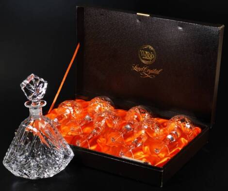 A Thomas Webb crystal drinks set, comprising decanter with heavily cut glass stopper, hobnail cut floral body and shaped shoulders, 29cm H, and a boxed set of six hock glasses, each with a repeat floral hobnail cut decoration to each bowl, with plain stem