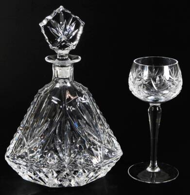 A Thomas Webb crystal drinks set, comprising decanter with heavily cut glass stopper, hobnail cut floral body and shaped shoulders, 29cm H, and a boxed set of six hock glasses, each with a repeat floral hobnail cut decoration to each bowl, with plain stem - 2