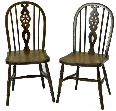 A pair of child's wheel back chairs, on ring turned legs joined by H stretchers, 62cm H.