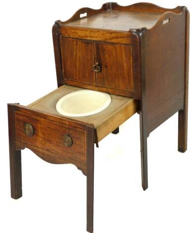 A George III mahogany night commode, with galleried top raised above double cupboard and partial pull out commode, on angle stiles, 87cm H, 53cm W, 50cm D. (AF)