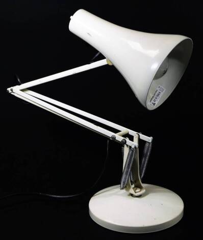 A late 20thC angle poise lamp, with cone shaped shade and shaped stem on circular foot, when extended 90cm H.