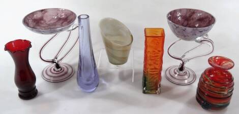 Two Studio style glass tassa, each with amethyst coloured glass bowls and entwined stems and circular feet with a swirl pattern in purple, 18cm H, Baxter type Whitefriars style vase, various other swirl design, etc. (a quantity)