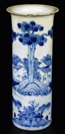 A 19thC Chinese Qing period blue and white porcelain vase, of cylindrical form, decorated all round with buildings, figures and trees, on a circular foot, four character mark beneath, 21cm H.