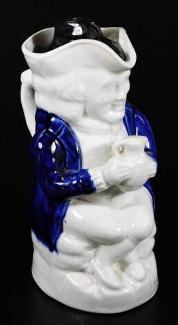 A blue and white decorated Toby jug and cover, c.1900, 24cm H.