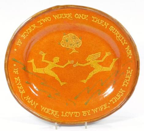 A 20thC slipware dish, If Ever Two Were One Then Surely We If Man Were Lov'd By Wife Than Thee, of oval form, 36cm W, unmarked.