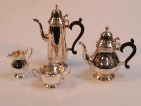 Elizabeth II four-piece silver tea and coffee set of early Georgian design