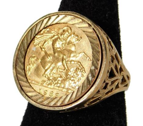 A Queen Elizabeth II gold half sovereign, in basketweave ring setting, size T, 9.5g all in.