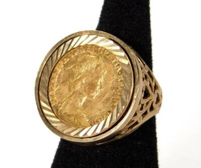 A Queen Elizabeth II gold half sovereign, in basketweave ring setting, size M, 9g all in.