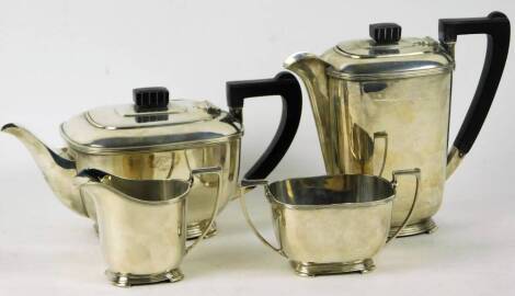 A George VI Art Deco silver tea set, four piece, Sheffield 1942, 65oz all in.