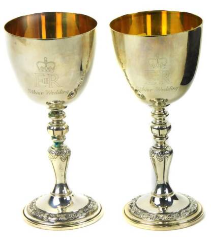 A pair of Garrard silver goblets, commemorating the Silver Wedding Anniversary of HM Queen Elizabeth II and HRH The Duke of Edinburgh limited edition 1380 and 1381/2550, boxed with certificate, London 1972, 12oz.