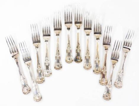 A set of twelve George IV silver dinner forks, by William Eaton, shell capped King's pattern, monogrammed, London 1829, 21cm W, 39oz. (12)